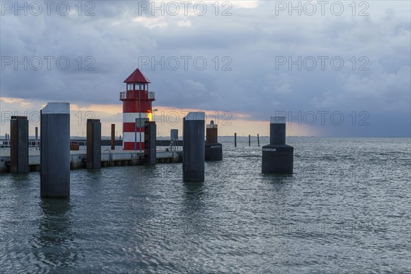 Lighthouse in the harbour entrance Wyk auf Foehr