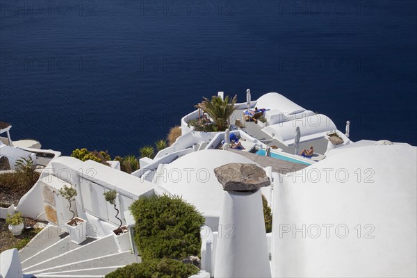 Staircase to hotel with an inner courtyard in Imerovigli