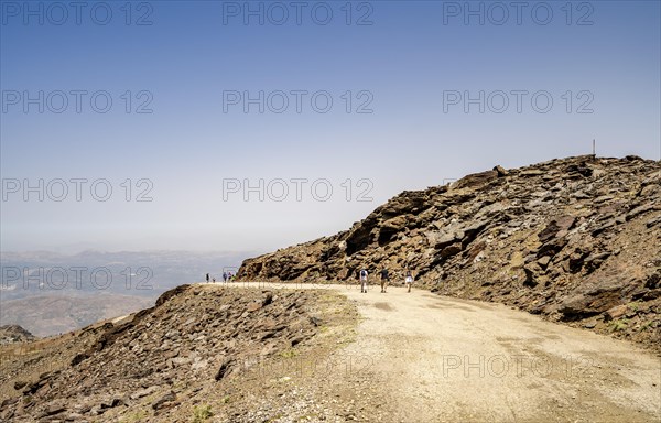 Trekkers on the trail in Sierra Nevada National Park close to Granada