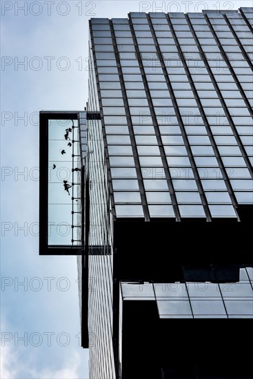 People standing on the glass floor of Maha Nakhon Tower