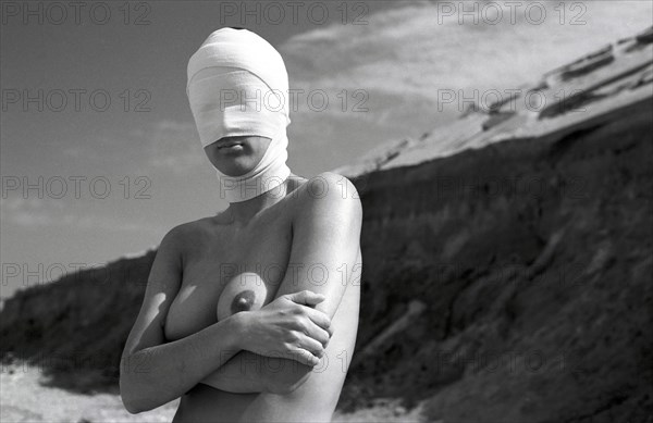 Woman with head bandage