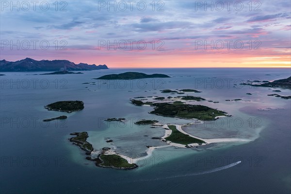 View of small islands in the sea near Sommaroy