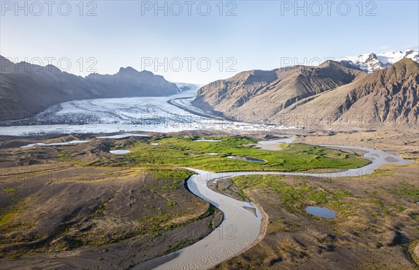 Glacier river in front of Mountains