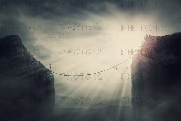 Person on the edge of precipice determined to overcome the obstacle by passing an old slackline bridge