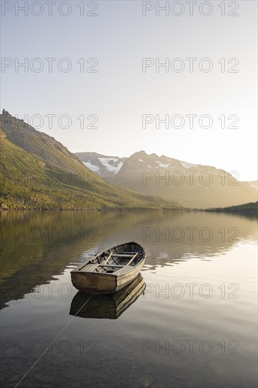 Rowing boat in the backlight