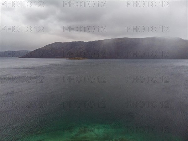 Rain shower moves over the Kvaloya peninsula