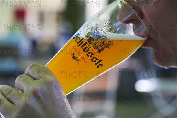 Man drinking wheat beer