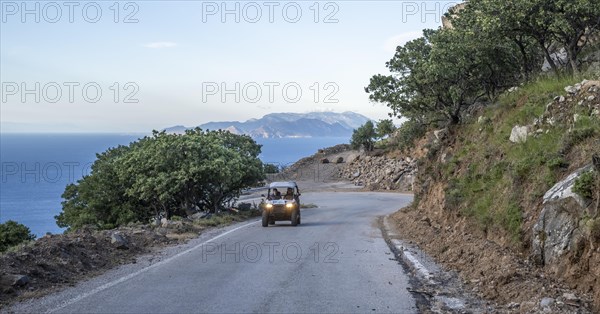 Beach Buggy on Street with Sea View