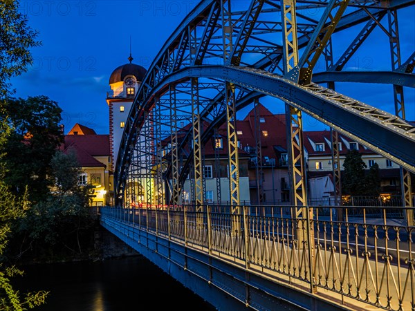 Waasen bridge over the river Mur and historic toll tower