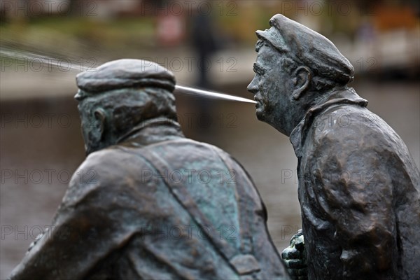 Bronze statues of dolphin spitters Joke Rinne and Hinnerk de Vries at the Ratsdelft