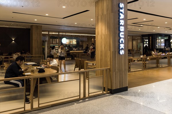 Starbucks lettering illuminated