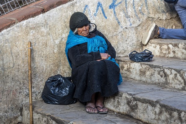 Old woman having a nap