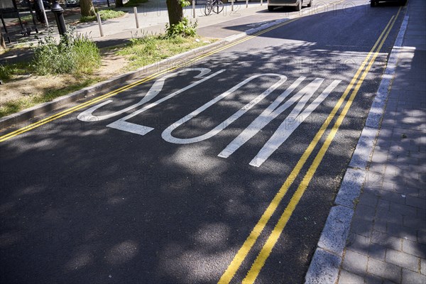 Slow lettering on traffic-calmed street