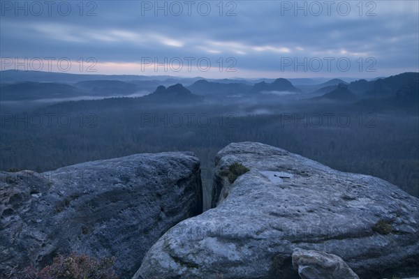 View from Kleiner Winterberg in front of sunrise View of Lorenzsteine and Hinteres Raubschloss or Winterstein