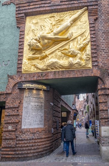 Entrance to Boettcherstrasse with the facade relief The Lightbringer by Bernhard Hoetger and the Paula Becker Modersohn House