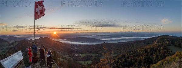 Sunrise with autumn fog with alpine panorama