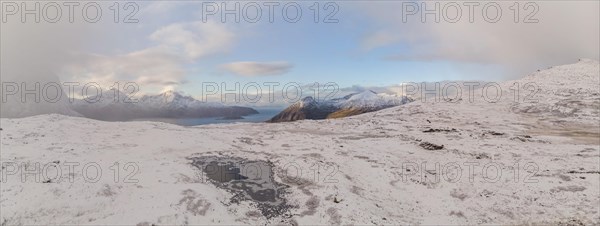 Hiking trail in the first snow at Brosmetinden