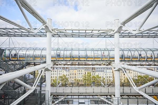 Visitors to the Centre Pompidou on the paths in the tubular corridors of the cultural centre. Centre Georges Pompidou