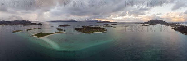 View over the sea with fish farms to Baltsfjorden and the mountains of Balten