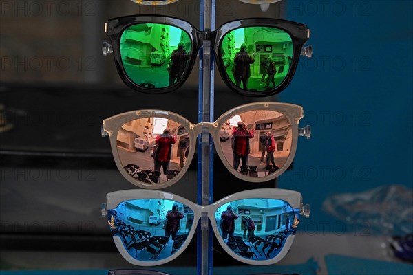Three pairs of sunglasses