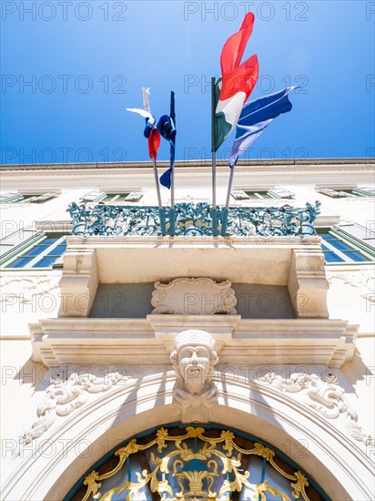 Flags flying at the late Baroque palace Besenghi degli Ughi