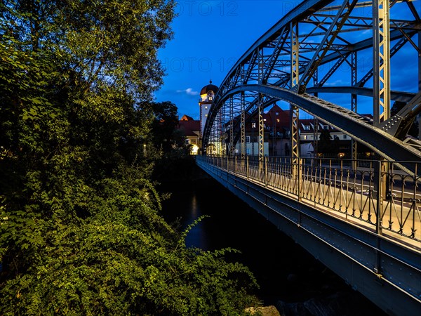 Waasen bridge over the river Mur and historic toll tower