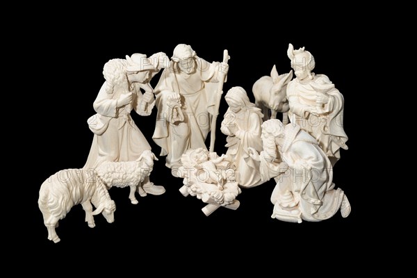 Carved wooden nativity scene figurine