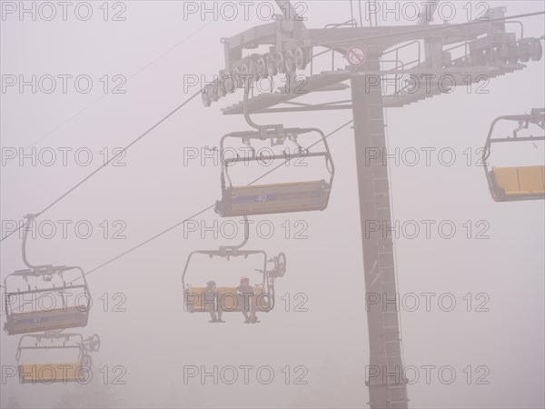 Bocksberg chairlift disappears in the fog