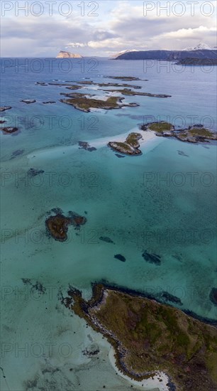 View across Hajafjorden to the island of Haja with the steeply sloping Nipen