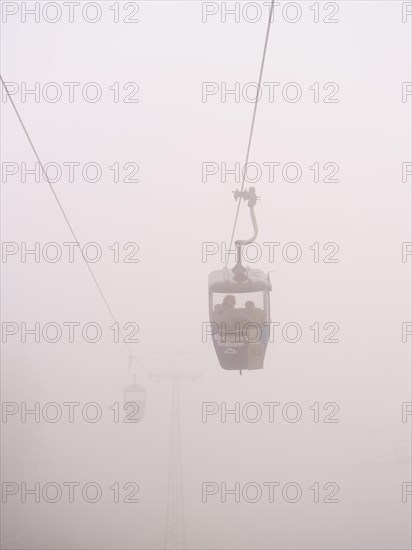 Bocksberg cable car disappears in the fog