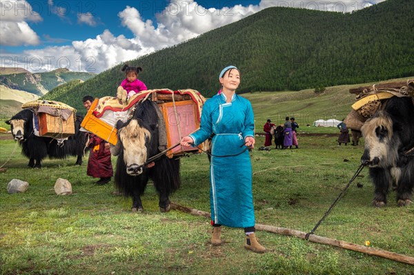 The nomadic family moves with yaks in the summer. Bayanhongor Province