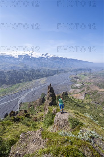 Hiker looking over landscape