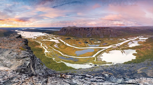 View from Skierffe mountain over the autumnal Rapadalen river delta