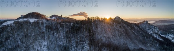 Sunrise at the Frohburg castle ruins and Geissflue summit cross