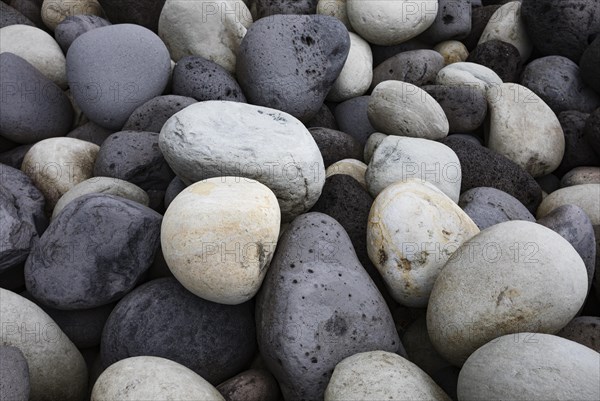 Large round stones on the coast of Rocha da Relva