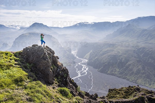 Hiker looking over landscape