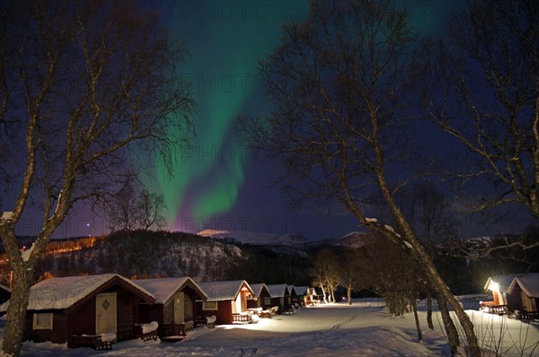 Small cabins in wintry landscape