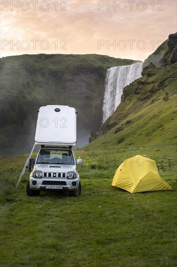 Car with roof tent and tent