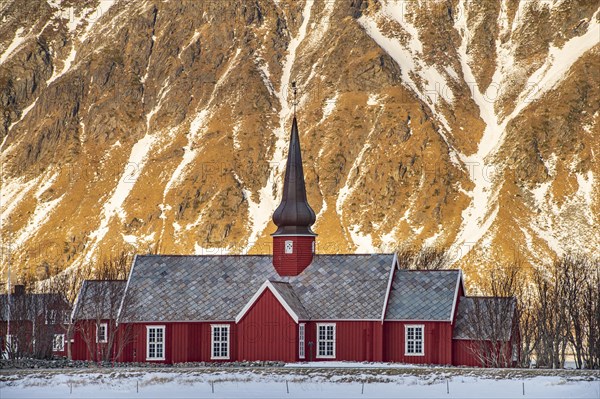 Winter Scandinavian landscape with stave church