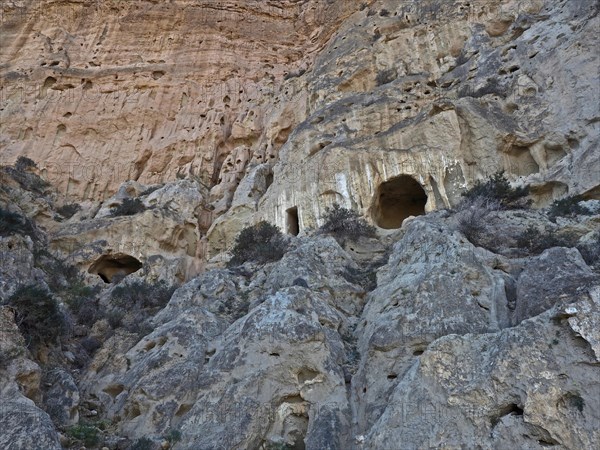 Entrance to cave dwellings in rock face