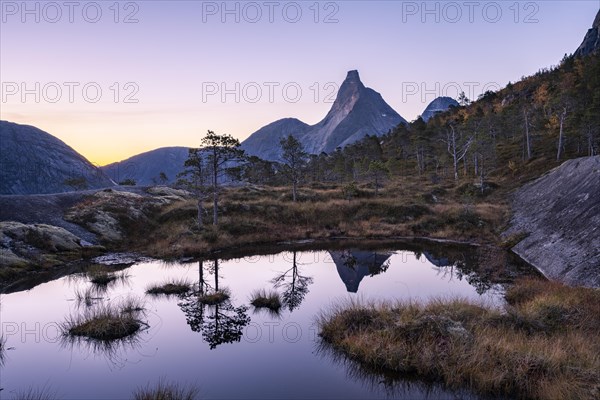 Stetind reflected in small pond