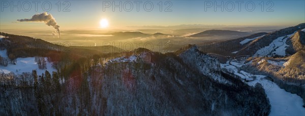 Sunrise at the Frohburg castle ruins and Geissflue summit cross