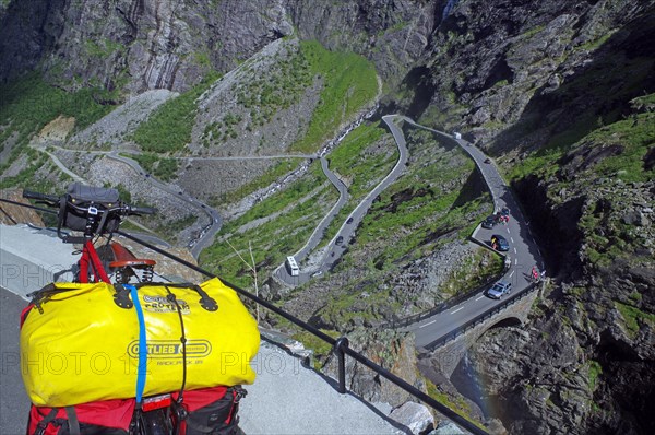 Packed bicycle on a mountain road with serpentines