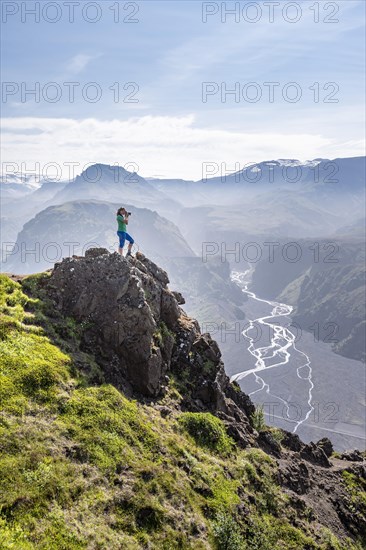 Hiker looking over landscape