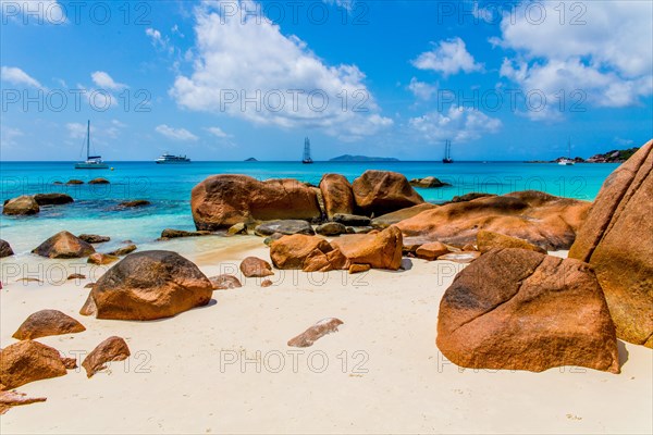 Dream beach with sailing boats