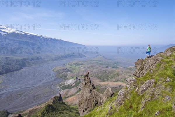 Hiker looking over landscape