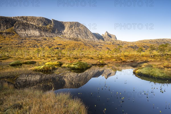 Mount Kulhornet reflected in small pond