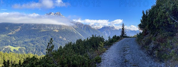 Fog band and prominent debris flow channel at Klopaierspitze