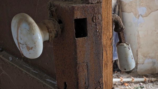 Old door with hanging door handle