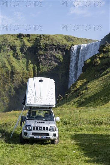 Car with roof tent